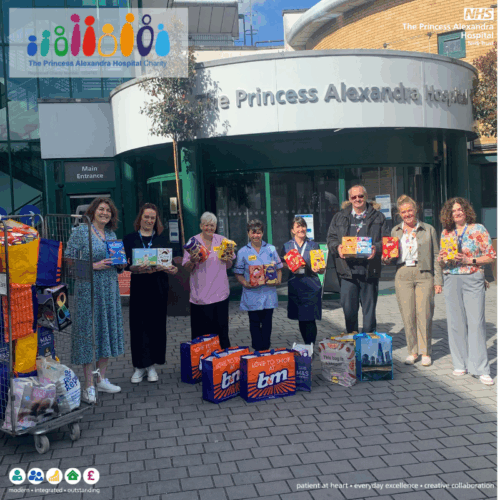 Local train operator, Greater Anglia staff, outside the Princess Alexandra Hospital delivering 348 Easter eggs and activity kits.