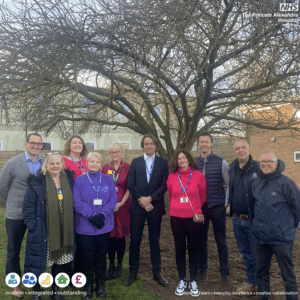 The Princess Alexandra Hospital NHS Trust (PAHT) staff gather in the new therapeutic gardens.